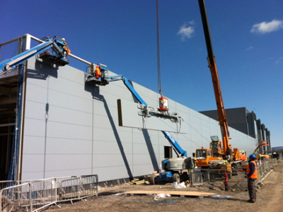 Installation of heavy cladding panels.png