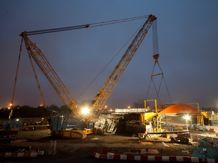 A crawler crane installing L01 Bridge at Olympic Park, London (Image courtesy of Mabey Bridge Ltd.)