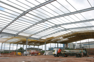 Purlins spanning between rafters in the roof