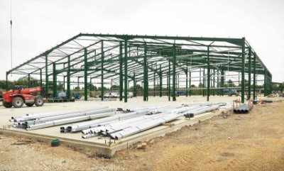 Steel goes up on the previously completed slab