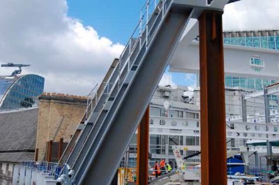 Mansards on the building’s upper floors help the structure adhere to rights-to-light requirements