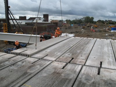 Erecting precast floor planks Image courtesy of Severfield (Design & Build) Ltd.