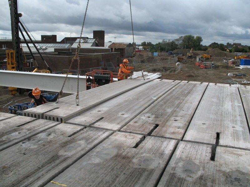Erecting precast floor planks (Image courtesy of Severfield (Design & Build) Ltd.)