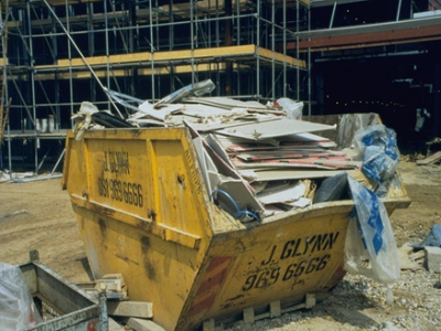 A skip of mixed construction waste; a common sight on many construction sites