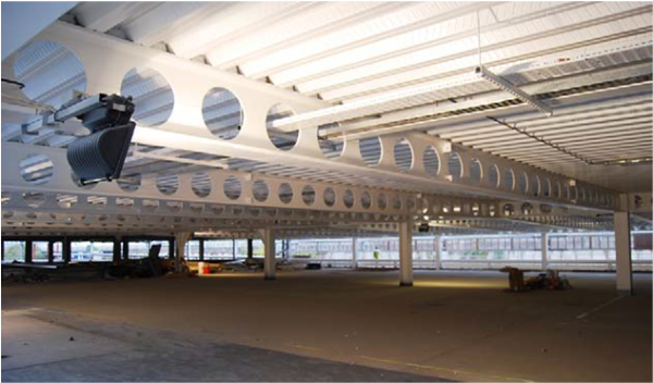 Cellular beams and decking with bright white coatings, Douglas Village, Cork (Image courtesy of Bourne Parking Ltd.)