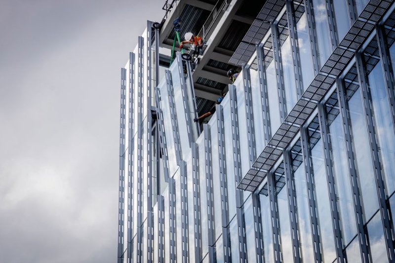 The steel frame will be visible through the building's extensive glazing