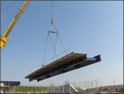 Erection of girders complete with cantilever falsework and formwork (Image courtesy of Mabey Bridge Ltd.)