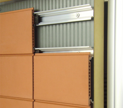 Use of composite (sandwich)panels to support tiles. (Image courtesy of Kingspan Panels and Profiles)