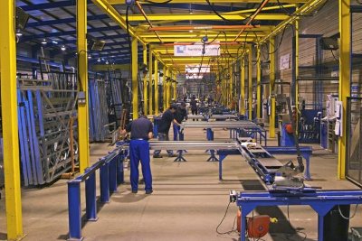 Offsite manufacture under factory-controlled conditions
