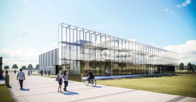 A secondary steel frame supports the building's feature glazed façade