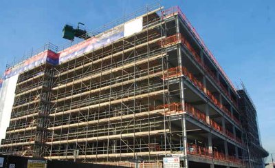 Scaffolding has been erected to allow the installation of the cladding system