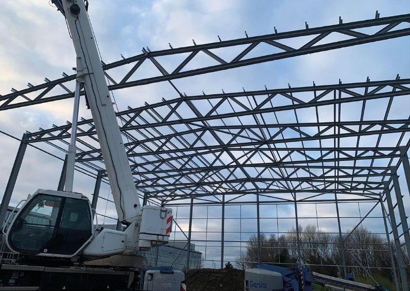 Using up to four cranes, both structures were erected simultaneously to meet the client's completion date