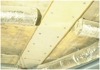 Protected 'Slim floor' beam with precast concrete planks