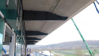 Large bespoke brackets support the balconies