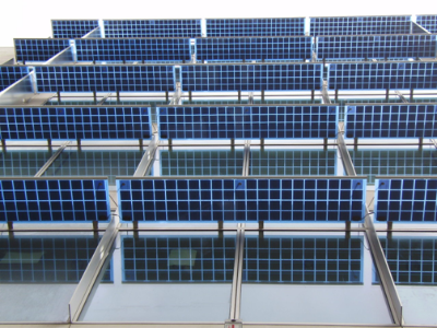 Solar shading with bonded photovoltaic cells attached to a curtain walling system
