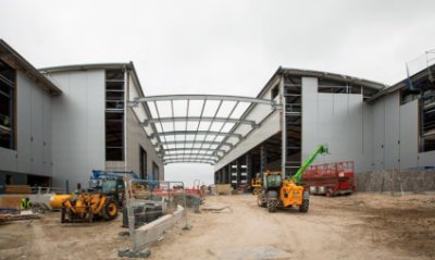 The two buildings are connected by a covered courtyard