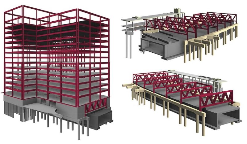 The steel frame sits on top of a series of trusses that span a major thoroughfare