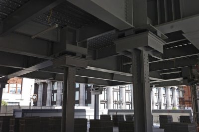 Large bearings isolate the upper levels of the building