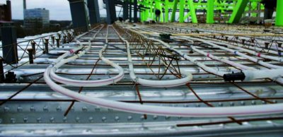 Laying water pipes in a concrete floor slab