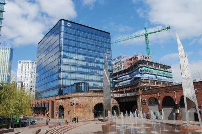 Both buildings sit on a podium once occupied by Exchange Station