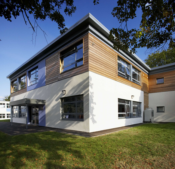 Modular school building with insulated render and cedar wood cladding (Image courtesy of Portakabin)