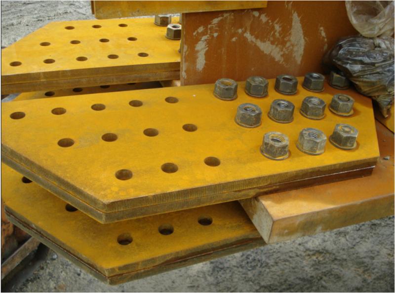 Multiple cover plate ‘plies’ at a splice to enable preloaded bolts to bed down properly (Image courtesy of Mabey Bridge Ltd.)